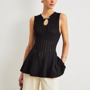 Semi-Sheer Knit Peplum Top With Bow Detail